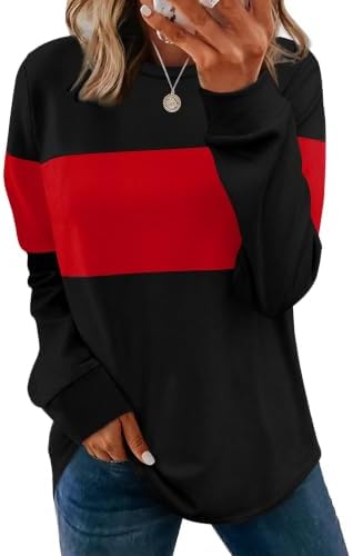 A soft crewneck tunic cut with long sleeves, side slits, and a curved hem that drops past the hips for easy layering.