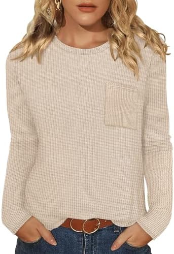 Textured thin waffle knit in warm apricot makes this crewneck top an easy match for dark denim or relaxed office trousers.