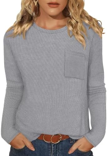 Textured waffle knit gives this grey crewneck top a soft, breathable drape for cooler mornings and layered office days.