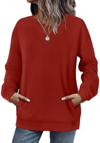 A rich red crewneck sweatshirt cut with dropped shoulders and a hidden side pocket for easy layering through cool weather.