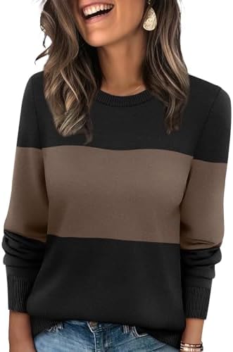 A ribbed knit crewneck in deep black and chocolate brown panels, cut loose for easy layering when the weather turns cooler.