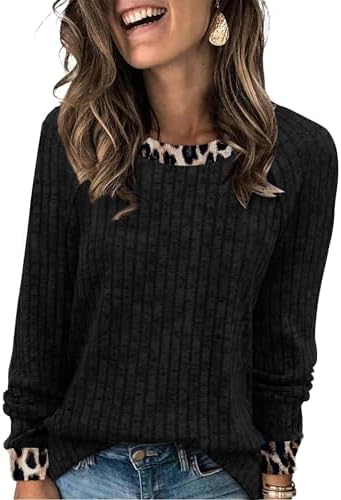 Black leopard spots bring a subtle graphic contrast to this soft long sleeve knit, cut loose through the body for easy layering.