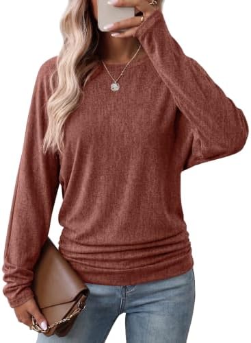 A rich caramel pullover cut with roomy batwing sleeves and side shirring that gathers gently at the hips.