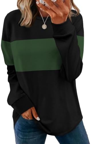 A relaxed green tunic cut from a lightweight knit with side slits and a long curved hem that falls past the hip line.