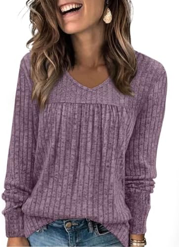 A soft ribbed purple knit with a relaxed V-neck and neat front pleating, ready for cool mornings and easy evening layering.