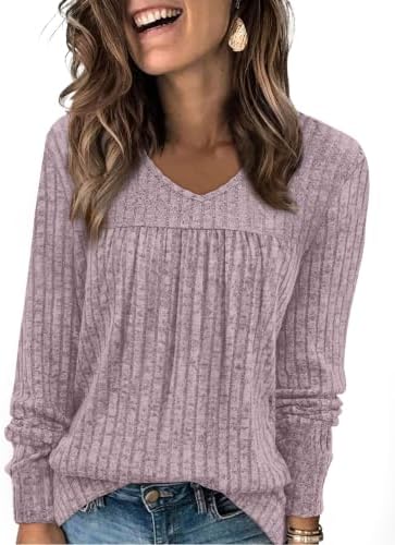 A soft pink ribbed knit top with a neat V-neckline and gentle front pleats, cut for easy layering on cool evenings.