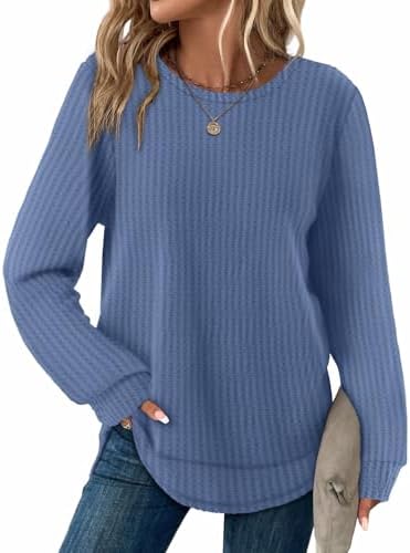 Textured waffle knit in a clear blue shade gives this loose long sleeve tunic a breezy feel for cooler mornings.