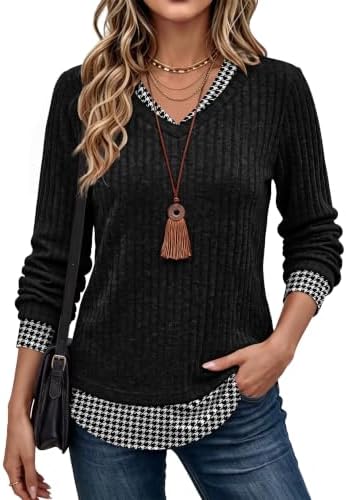 A built-in layered collar and hem detail bring instant dimension to this lightweight ribbed tunic sweater.