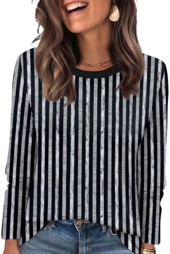 Crisp black stripes give this soft crewneck tunic a clean graphic look that pairs easily with dark denim or leggings.