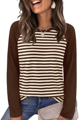 Rich chocolate brown panels meet creamy apricot stripes on this long sleeve knit designed for cool mornings and layered afternoons.