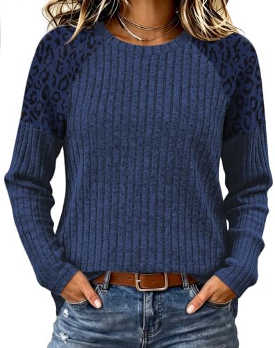 Tonal leopard raglan sleeves bring subtle texture to this deep navy stretch knit, cut relaxed for easy tucking into trousers.