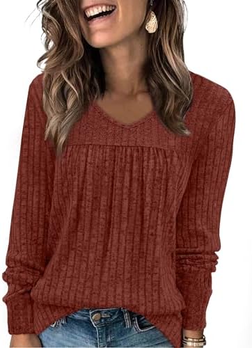 Caramel tones bring rich warmth to this ribbed knit tunic top, cut with a clean V-neckline and gentle front pleats.