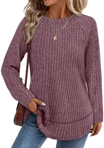 Ribbed purple knit cut in a tunic length with a curved high-low hem and easy side slits for cool-weather layering.