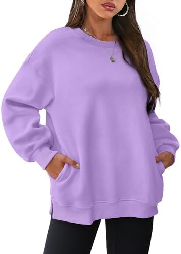A soft light purple pullover with subtle side slits and hidden pockets for breezy mornings and cool evenings.
