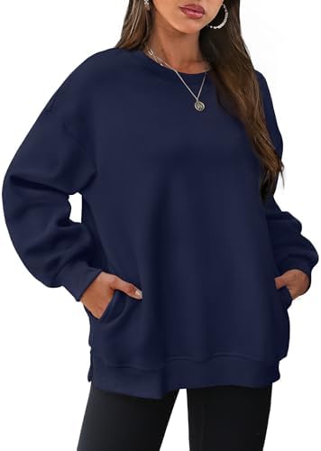 Deep navy fleece knit brings dependable warmth and an easy drape to this crewneck pullover cut with room to move.