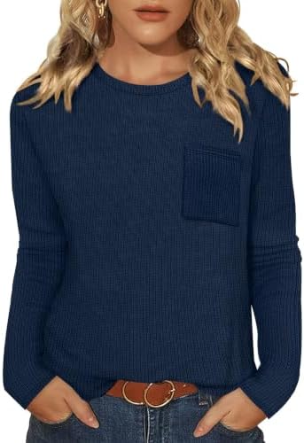 A soft waffle knit in clear blue, cut with a relaxed crewneck and curved hem for breezy mornings and travel days.