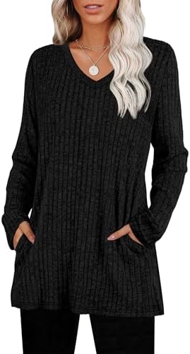 A deep black ribbed knit tunic cut with a clean V-neckline, long sleeves, and practical side pockets for everyday wear.