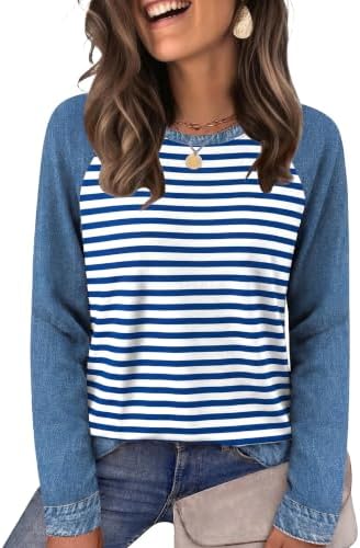 Horizontal color-block stripes meet a washed denim blue shade on a soft stretch knit designed for crisp autumn evenings.