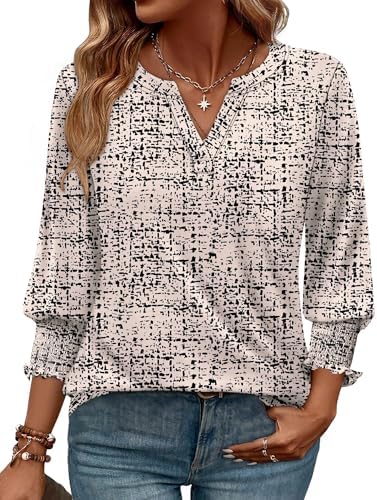 Tailored khaki houndstooth pattern meets an easy V-neckline and gentle three-quarter sleeves with gathered elastic cuffs.