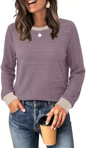 Plush purple colorblocking brings a cozy feel to this lightweight crewneck top, cut loose through the body for cool-weather ease.