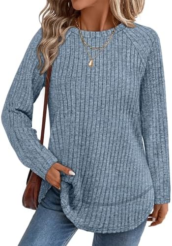 A soft ribbed tunic in crisp blue with a curved high-low hem and side slits that pair neatly with leggings on cooler days.