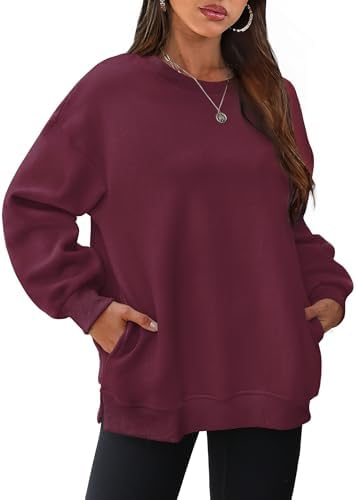 Brushed fleece in deep maroon keeps cool breezes out while side slits let the hem move easily over leggings.