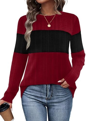 Bold panels of deep red and black split across the chest and arms give this lightweight pullover a clean graphic feel.