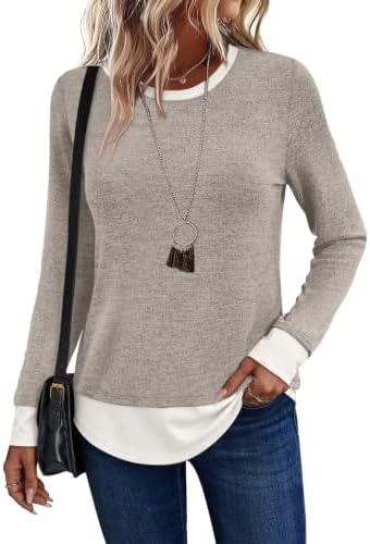 A soft color-block knit pairs warm coffee tones with clean white bands for easy layering on crisp mornings and cool patio nights.