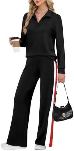 Spacer fabric in solid black creates a smooth half zip top and wide leg pants pairing built for chilly flights and road trips.