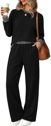 Brushed fleece knit in saturated black pairs a crewneck raglan pullover with relaxed wide-leg trousers for cooler days.