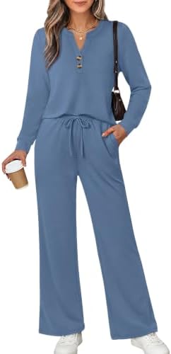 Cut from drapey spacer knit, this blue two-piece set pairs a notched V-neck top with wide-leg drawstring pants for cool weather.