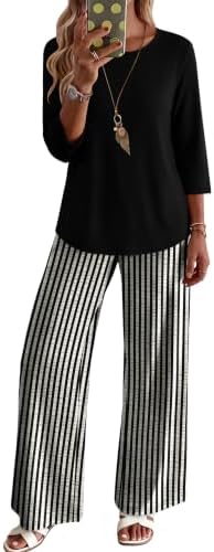 Crisp black and cream stripes bring sharp definition to this relaxed two-piece set cut with three-quarter sleeves and soft pants.