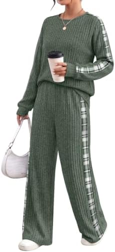 Vertical ribbed knit defines this two-piece set, finished in rich green with contrast side stripes along the sleeves and pants.