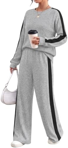 Vertical ribbed knit in grey with crisp black side stripes shapes this two-piece set for relaxed days and travel.
