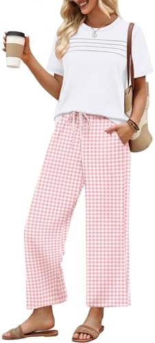 Gentle pink plaid prints cover this breezy two-piece set, pairing a pleated short-sleeve top with cropped wide-leg pants.
