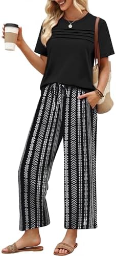 Crisp black stripes give this soft two-piece lounge set a tidy pattern that works straight from an airport terminal into town.
