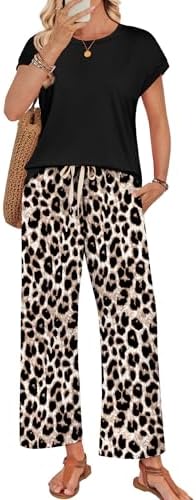 Muted black leopard print pairs a cap sleeve crewneck tee with loose, flowy wide-leg pants for easy warm-weather travel.