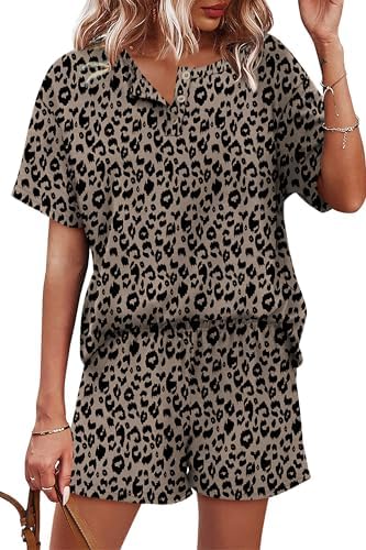 Bold leopard print gives this breezy two-piece set a sharp look, pairing a henley button top with matching pull-on shorts.