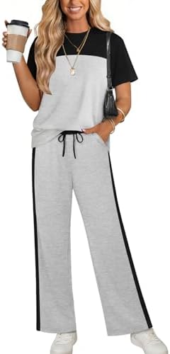 Heather grey knit pairs with sporty side stripes in a relaxed two-piece set built for travel days and quiet weekends.