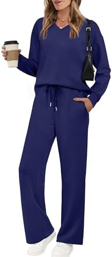 Cut in deep navy blue, this relaxed two-piece set pairs a dropped-shoulder V-neck pullover with easy wide leg pants.