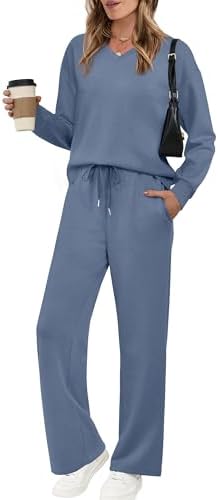 Soft dusty blue knits shape this relaxed two-piece set, pairing a dropped-shoulder V-neck with pocketed wide leg lounge pants.