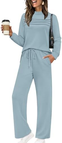 A cool lake blue set in airy four-way stretch spacer fabric, pairing a pleated long sleeve top with wide-leg cropped pants.