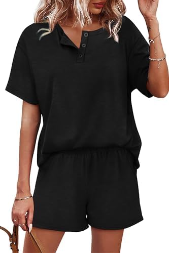 A solid black short set cut from lightweight tri-blend knit with a button henley top and deep side pockets.