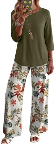 Deep army green grounds this two-piece set, combining a relaxed three-quarter sleeve top with floral pull-on lounge pants.