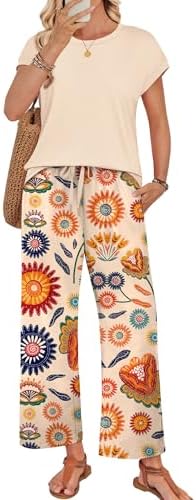Sunlit peach tones and soft botanical motifs shape this airy two-piece set, cut with cap sleeves and relaxed wide-leg pants.