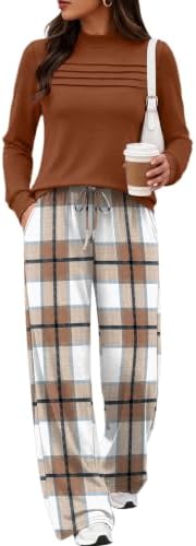 Rich caramel plaid patterns these wide-leg pants, paired with a soft mock-neck top cut with side slits for easy travel or lounging.