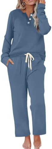 A rich blue two-piece set cut from soft polyester stretch knit, pairing a buttoned henley with wide leg lounge pants.