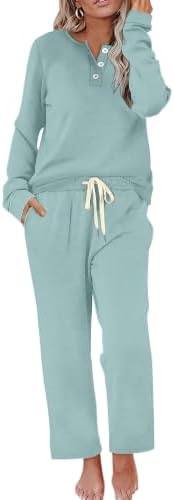 Muted sage green colors this soft two-piece set, combining a button-down henley top with roomy wide-leg sweatpants.