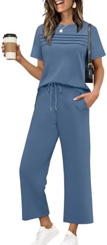Spun from a silky blue spacer knit, this two-piece lounge set pairs a side-slit top with wide cropped pants for easy travel days.