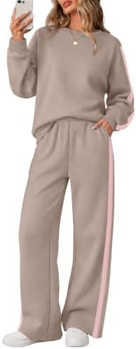 A muted greypink pullover paired with wide-leg pants, accented by crisp pink side stripes in brushed fleece.